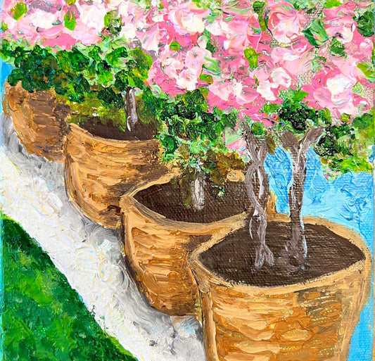 acrylic floral painting of topiaries with pink flowers