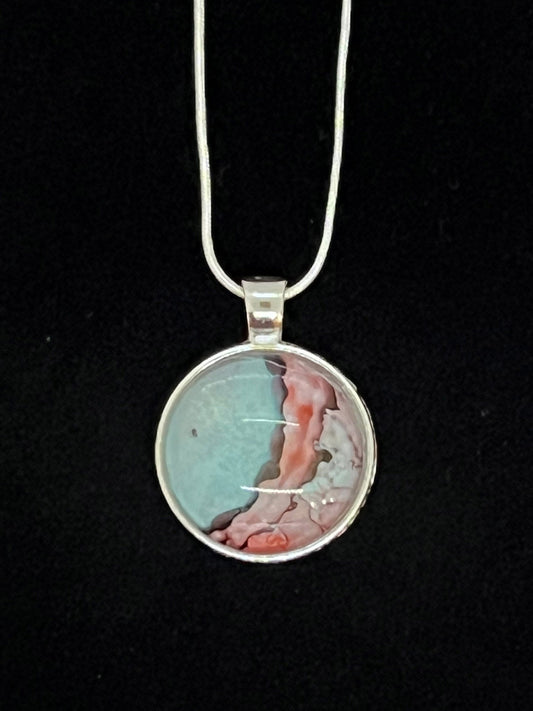 round cabachone dome silver pendant necklace with light blue and red artwork